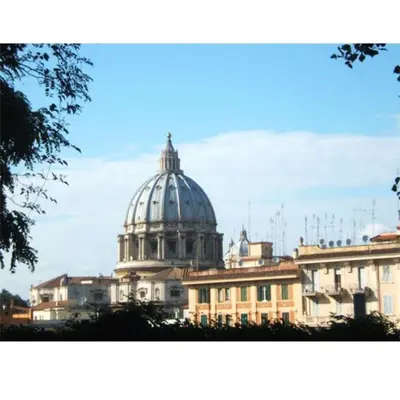 a building with a dome on top of it at St Peter Vatican- Stylish Apt, Roma in Rome