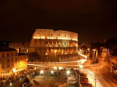 a large building in a city at night at Casa Alice in Rome