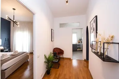 a living room with a couch and a table at Piazza Navona Elegant Apartment in Rome