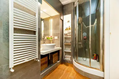a bathroom with a shower and a sink at River House in Rome