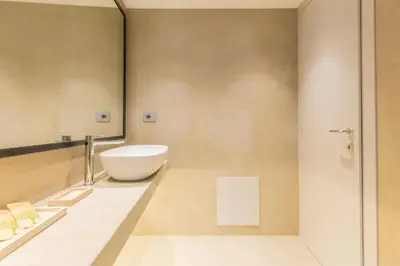 a bathroom with a white sink and a mirror at Spiriti Home Apartment 3, New Opening Piazza di Pietra in Rome