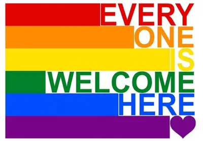 a colorful sign with the words every one is welcome here at A casa di Ugo - Colors and space at Pigneto, Rome in Rome