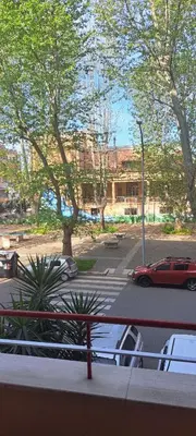 a view of a parking lot with a red car at Bart Rome House in Rome