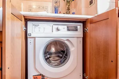 a washer and dryer in a small room at Casa da Annarella in Rome