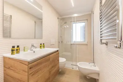 a bathroom with a sink and a toilet and a shower at APT ROME Sergio I - San Pietro Vatican in Rome