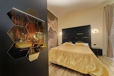 two pictures of a bedroom with a bed at Just Chilling Ferruccio in Rome