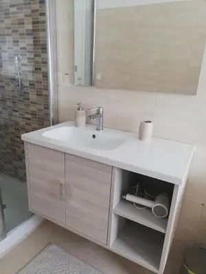 a bathroom with a white sink and a mirror at Vacanze romane in Rome