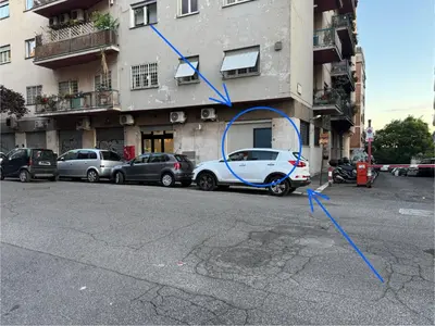 a car parked on the side of a building at Angoletto di Mirtilla in Rome