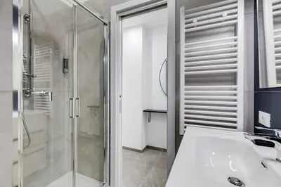 a bathroom with a shower and a sink at BDC - Mariposa 3BDR in San Giovanni in Rome