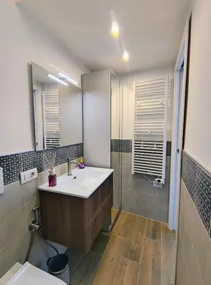 a bathroom with a sink and a shower at ERA Trastevere in Rome