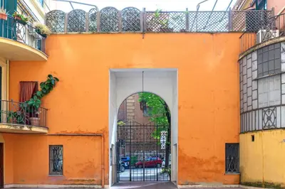 two women standing on a balcony at Ospiti di Jole al Pigneto in Rome