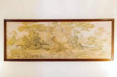 a framed painting of a vase on a wall at Elegantis Milos Suite Apartment - Your Chic Retreat in Central Rome in Rome