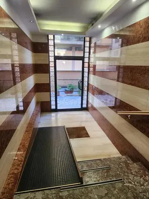 a room with a hallway with a window at La casetta di Marco in Rome