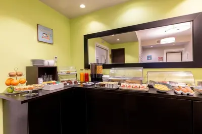 a buffet line with many different types of food at Chic&Town Luxury Rooms Piazza del Popolo in Rome