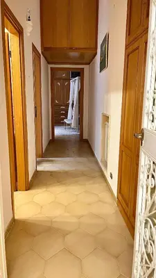 an empty hallway with a door and a room at Pantheon Luxury Noble Apartment in Rome