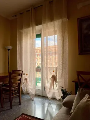 a living room with two couches and a couch at MyHomeinRome - Zona Re di Roma in Rome