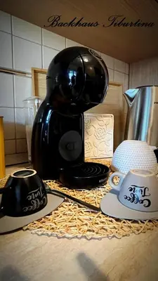 a coffee maker sitting on top of a counter at Backhaus Tiburtina in Rome