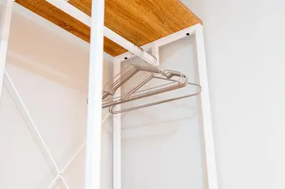 a metal towel rack on a glass door at Loft16 Rome - 10 min PlGNETO - COLOSSEO in Rome