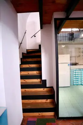 a staircase in a house with wooden floors at Loft in Rhome in Rome