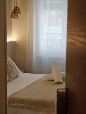 a bedroom with a bed and a window at Lilla Eco House - Vaticano in Rome