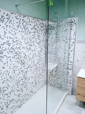 a shower with a glass door in a bathroom at Domus Remo Room #3 in Rome