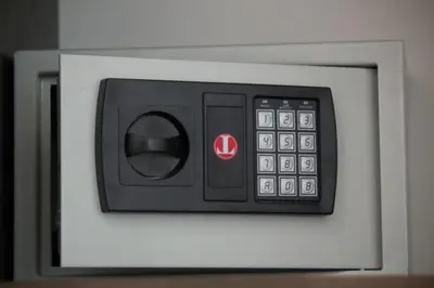a microwave with a remote control on it at Stardust Rome Guest House in Rome