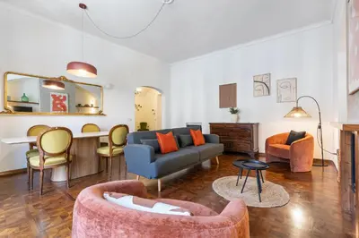 a living room with a couch and chairs and a table at Rome As You Feel - Argentina Luxury Apartment in Rome
