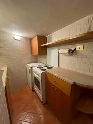 a small kitchen with a stove and a counter at Bnb cuore di Roma in Rome