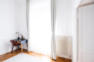 a desk in a room with a window at Stunning 1BR, 2BATH Apartment in the Heart of Rome 6C in Rome