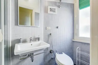 a bathroom with a sink and a toilet at BDC - Kingdom 5-BDR in Termini in Rome