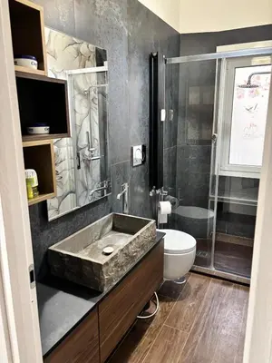 a bathroom with a sink and a toilet at Luca's House - Your perfect Roman hideaway in Rome