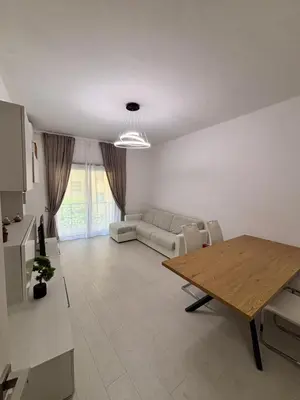a living room with a couch and a table at Luca's House - Your perfect Roman hideaway in Rome