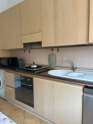 a kitchen with a sink and a dishwasher at Casa San Pietro Rome Vatican in Rome