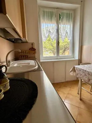 a kitchen with a sink and a window at Casa San Pietro Rome Vatican in Rome