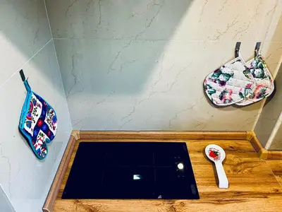 a cutting board with a knife and two purses at Charming apartment Eur in Rome
