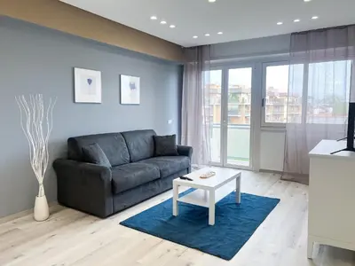 a bedroom with a bed with two towels on it at Domus Tiber in Rome