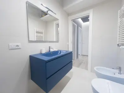 a living room with a couch and a table at Domus Tiber in Rome