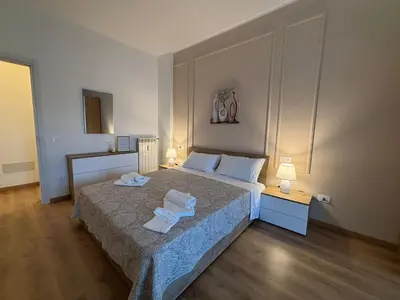 a bedroom with a bed with two towels on it at Inn Rhome 71 in Rome