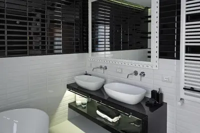 a white bathroom with two sinks and a mirror at Dreamers in Belsiana Condotti Int 9 in Rome