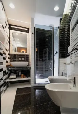 a bathroom with two sinks and a large mirror at Dreamers in Belsiana Condotti Int 9 in Rome