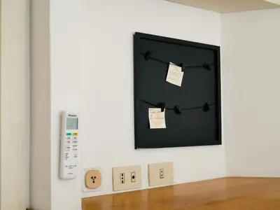 a wall with a tv and a remote control at Central Boutique Apartment for2 in Rome