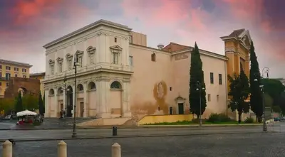 a large white building on a city street at DOMUS I Cozy Apt -20 min from Colosseum in Rome