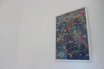 a painting hanging on a wall in a room at Relais Monteverde in Rome