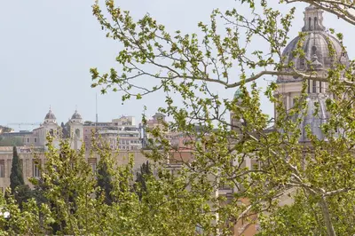 a building with a dome on top of it at Mellini View by Rental in Rome in Rome