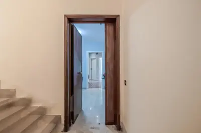 an open door to a room with a staircase at Star Guest House Rome in Rome