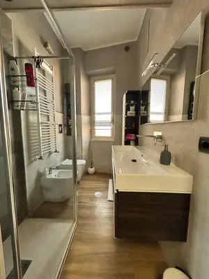 a bathroom with a sink and a toilet at Roma San Pietro alloggio turistico Casa Patrizia in Rome