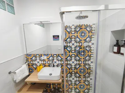 a bathroom with a sink and a shower at Re di Room in Rome
