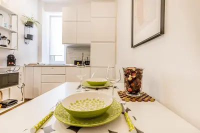 a kitchen with two glasses and a bowl on a counter at Urbano 29 apartment in Rome