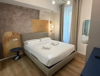 a bathroom with a shower and a sink at Maison Rasella Suites in Rome