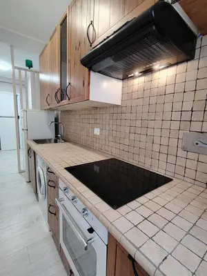 a kitchen with a sink and a stove at Sweet Home in Rome